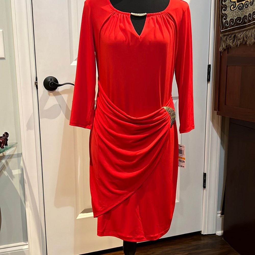 NEVER WORN red dress with gold neck pendent and waist buckle. Fabric will give.
